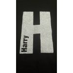 Kapucnis fekete kezeslábas (152-158)